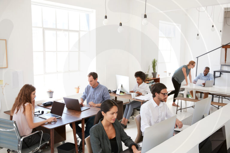 Group of young professionals working in an office