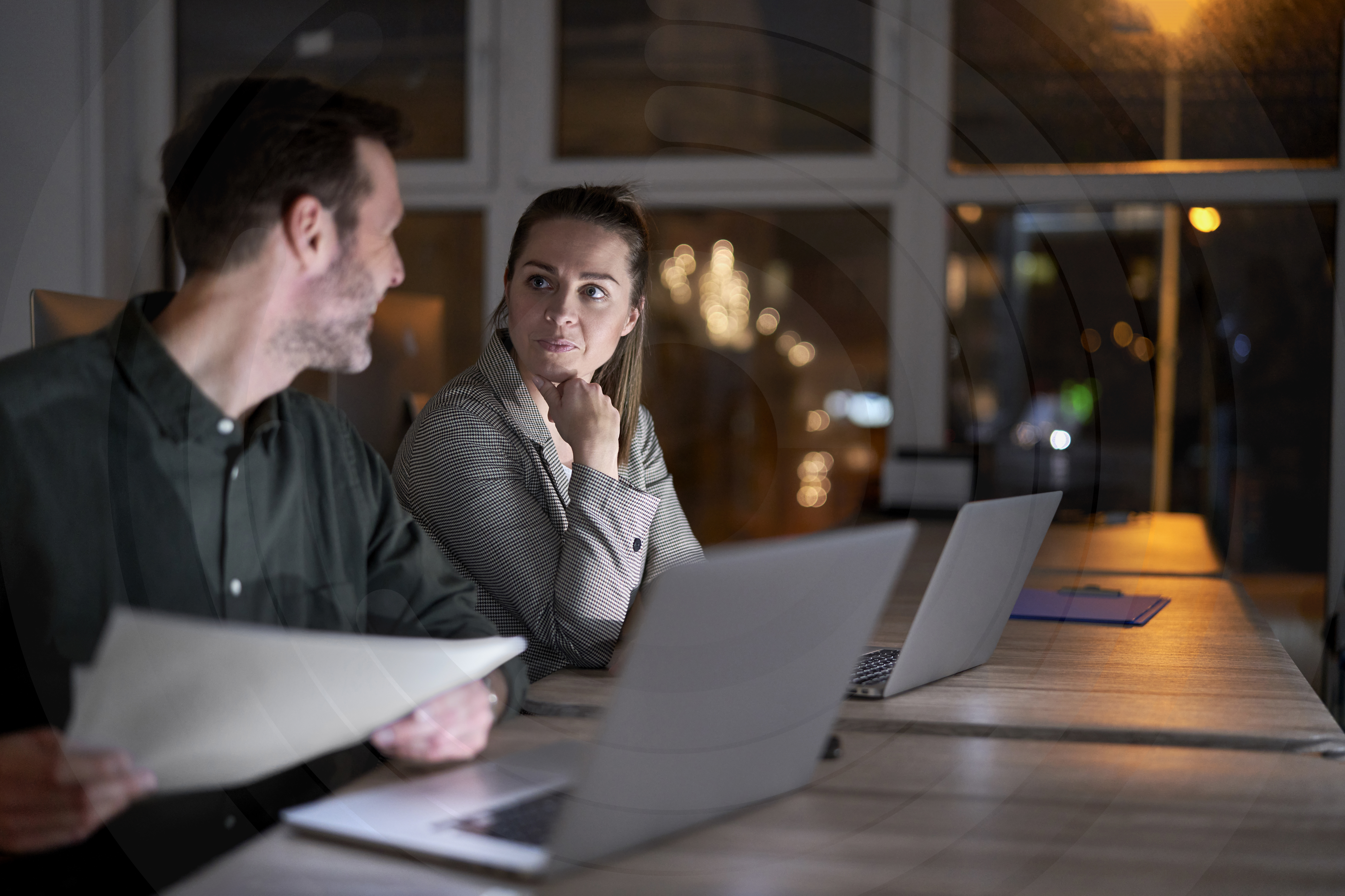 Causcasian workers working together at the office insider risk management